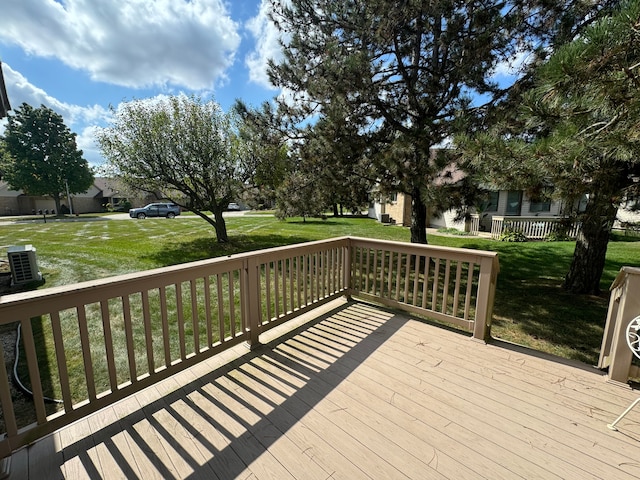 deck featuring a lawn