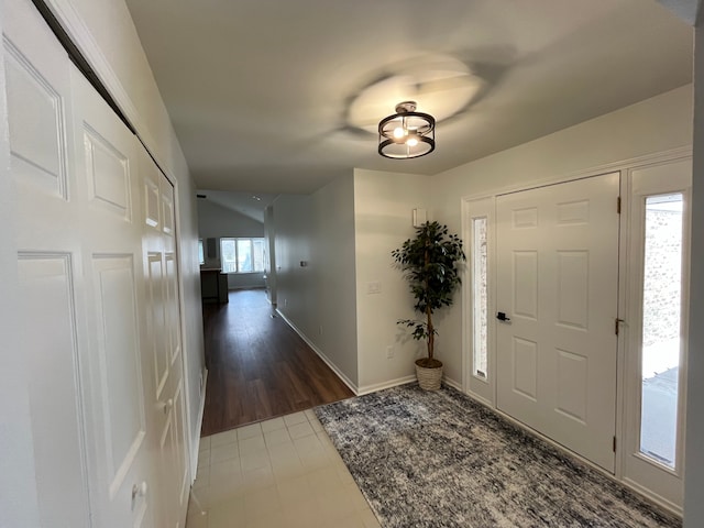 entryway with lofted ceiling