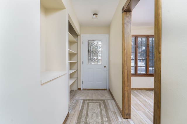 doorway to outside featuring light wood-type flooring