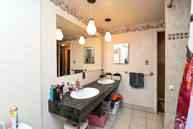 bathroom featuring sink and tile patterned flooring