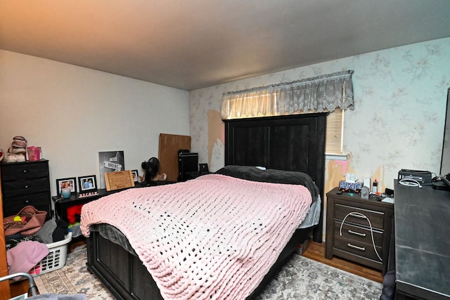 bedroom featuring light hardwood / wood-style floors