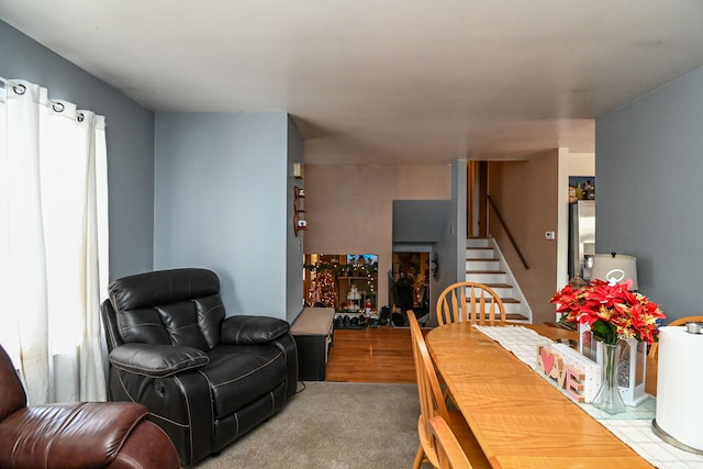 dining area with light carpet