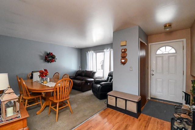 dining area with light hardwood / wood-style flooring