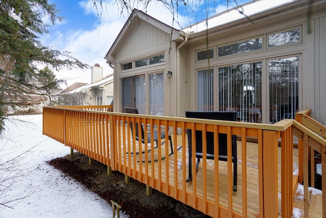 view of snow covered deck