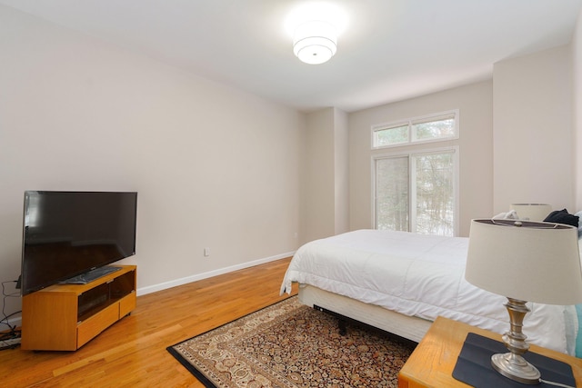 bedroom featuring hardwood / wood-style floors