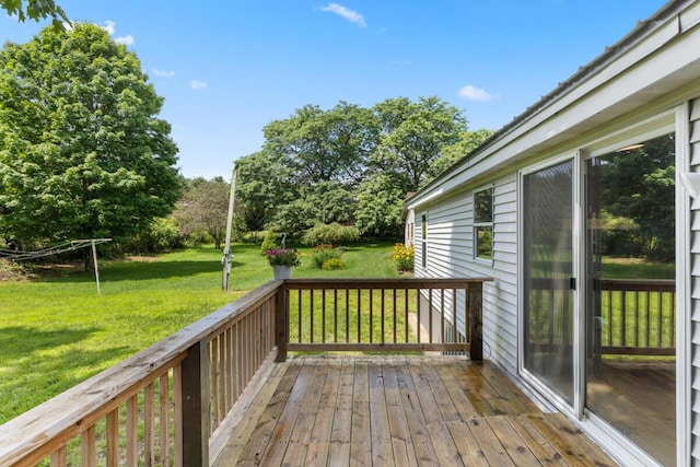 deck featuring a yard