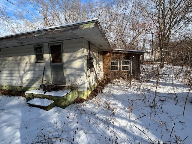 view of snowy exterior