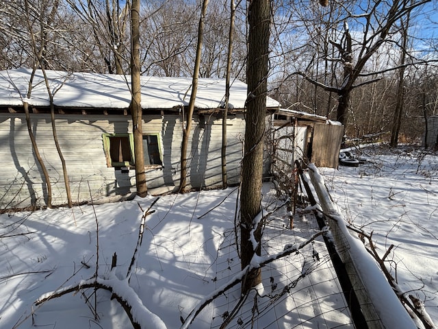 view of snow covered property