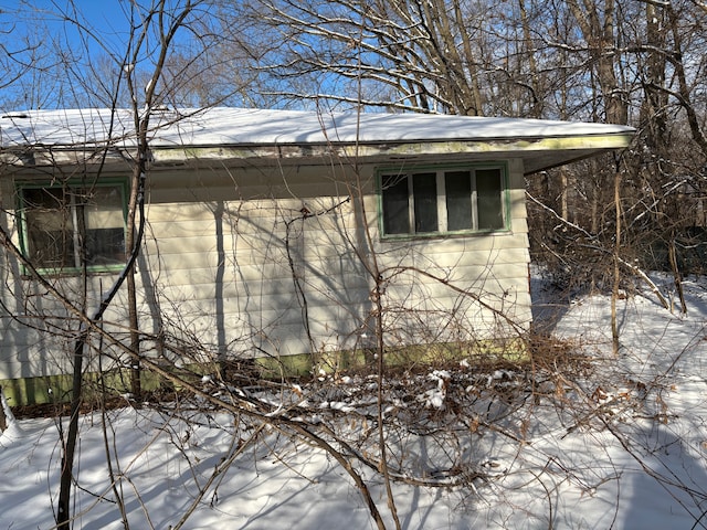 view of snow covered property