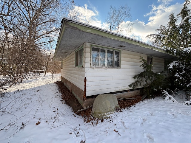 view of snow covered property