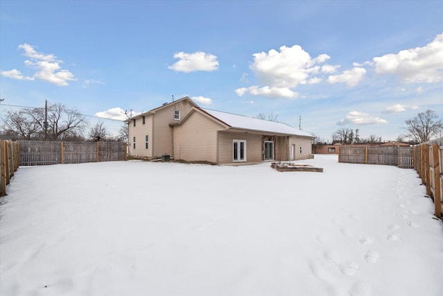 view of snow covered house