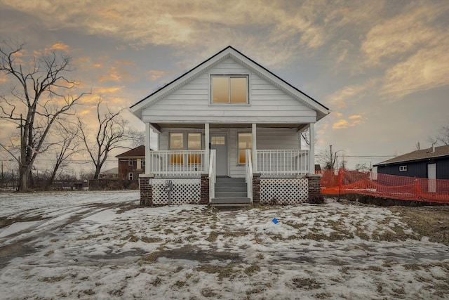 bungalow featuring covered porch