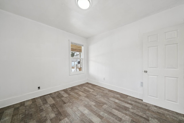 unfurnished room featuring hardwood / wood-style floors