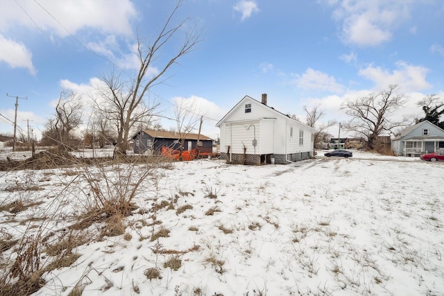 view of snow covered property