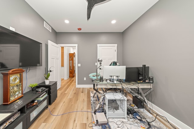 office space featuring light hardwood / wood-style floors