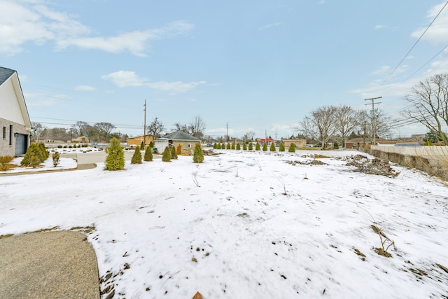 view of snowy yard