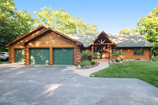 log-style house with a garage and a front yard