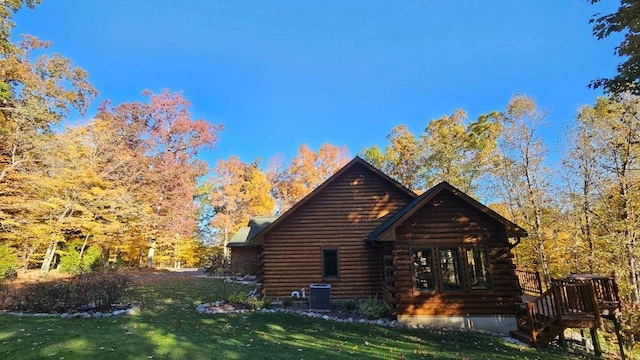 view of home's exterior featuring a lawn