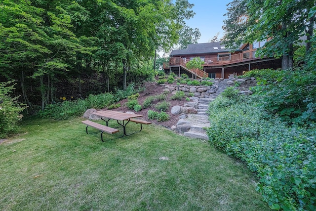 view of yard with a wooden deck