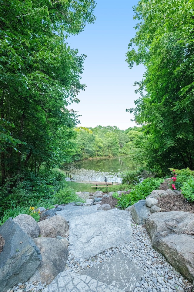 exterior space with a water view