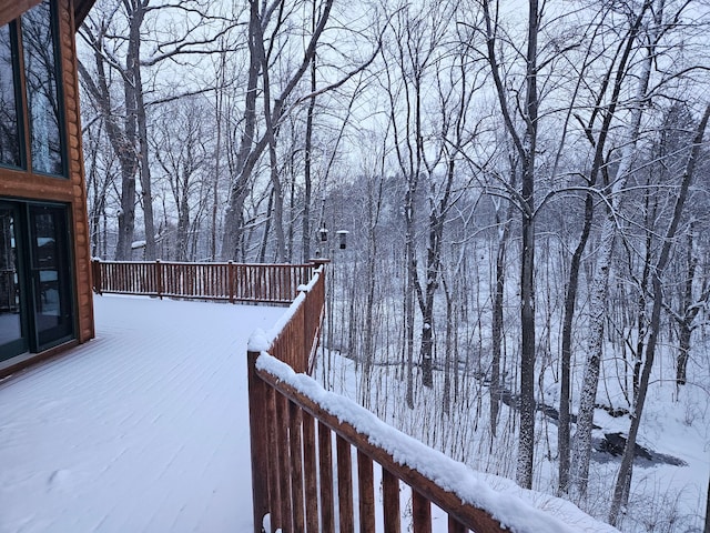 view of snow covered deck