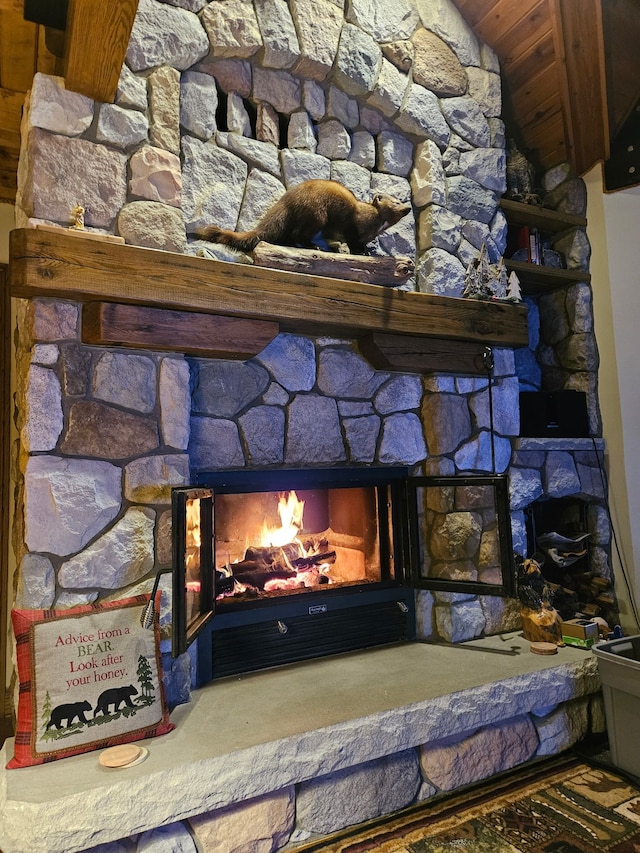 room details featuring a large fireplace