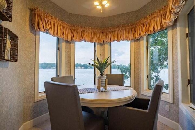 dining area with a water view