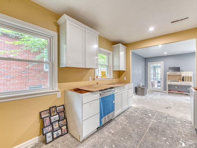 kitchen with white cabinets and dishwasher