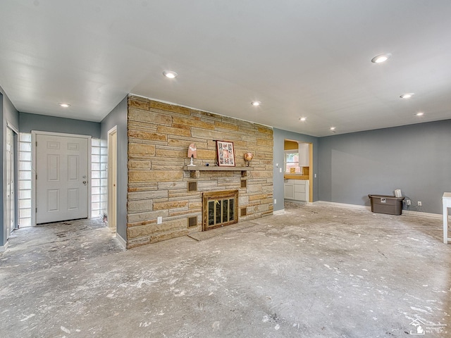 unfurnished living room featuring a fireplace