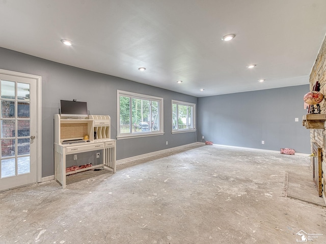 unfurnished living room featuring a fireplace