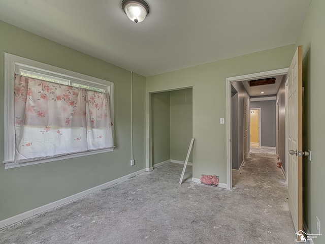 unfurnished bedroom with a closet