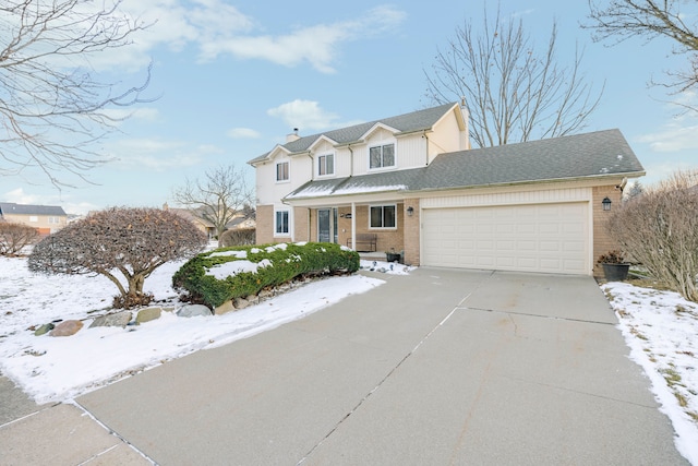 front of property with a garage