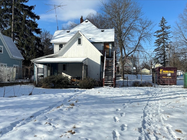 view of snow covered property