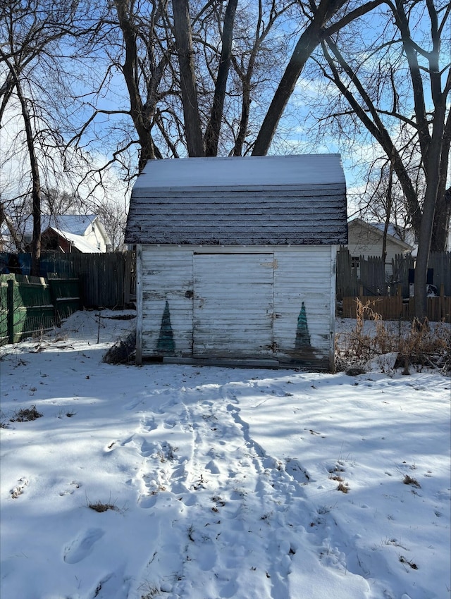 view of snow covered garage