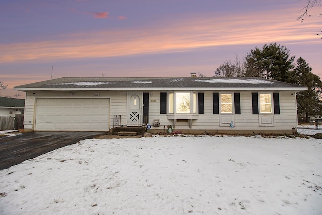 ranch-style house with a garage