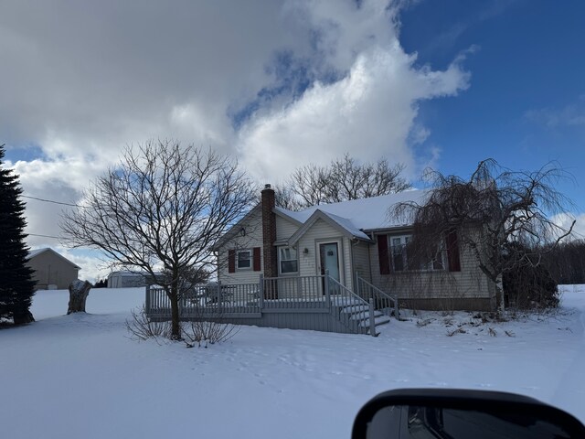 view of front of house with a chimney