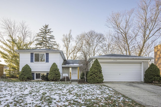 split level home with a garage