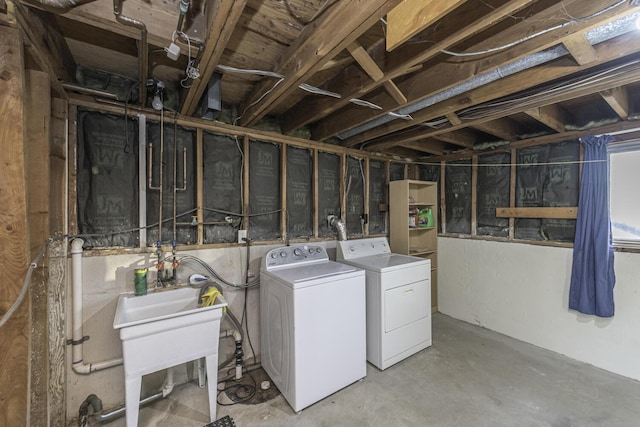 laundry room featuring washing machine and dryer