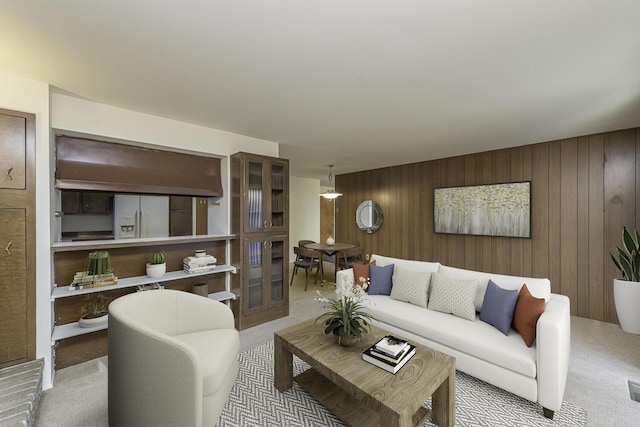 living room featuring wood walls