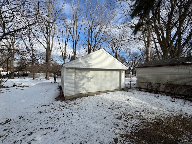 view of snow covered garage