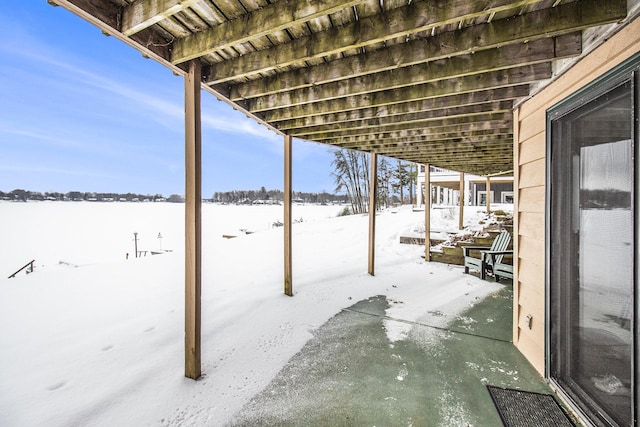 view of snow covered patio