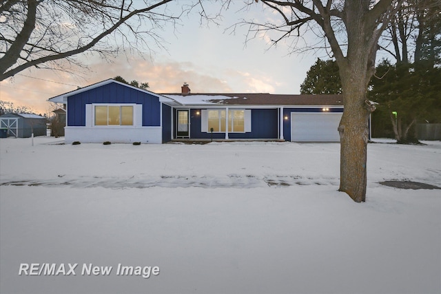 single story home with a garage