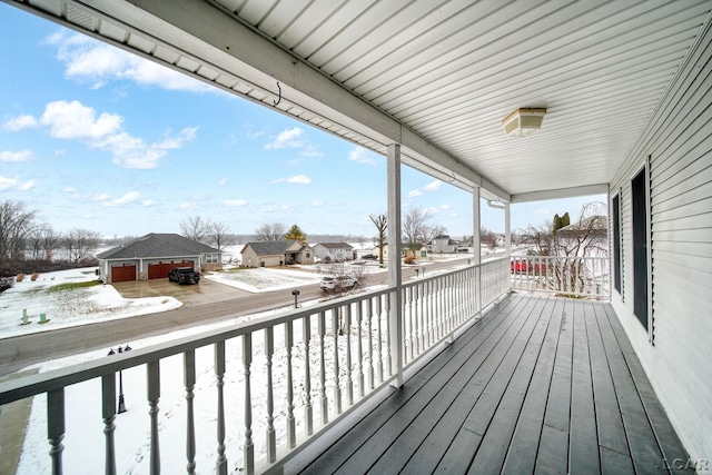 view of snow covered deck