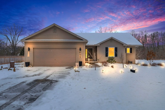 ranch-style home with a garage