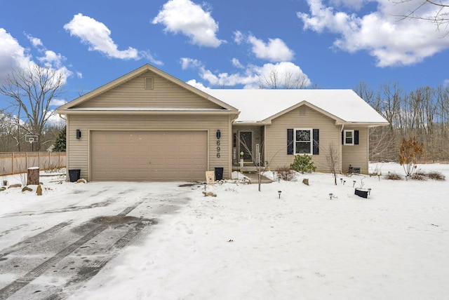 ranch-style home with a garage