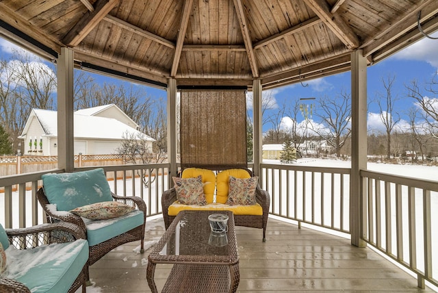 snow covered deck with a gazebo