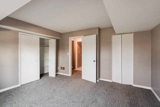 unfurnished bedroom with carpet floors