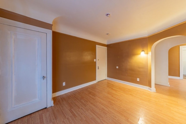 spare room featuring light hardwood / wood-style flooring