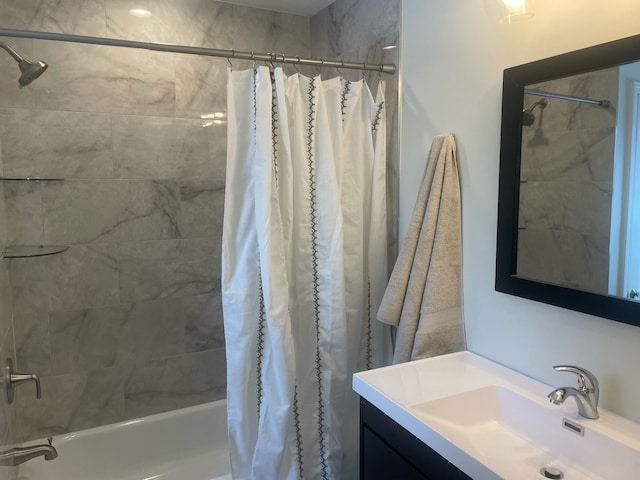 bathroom with vanity and shower / bath combination with curtain