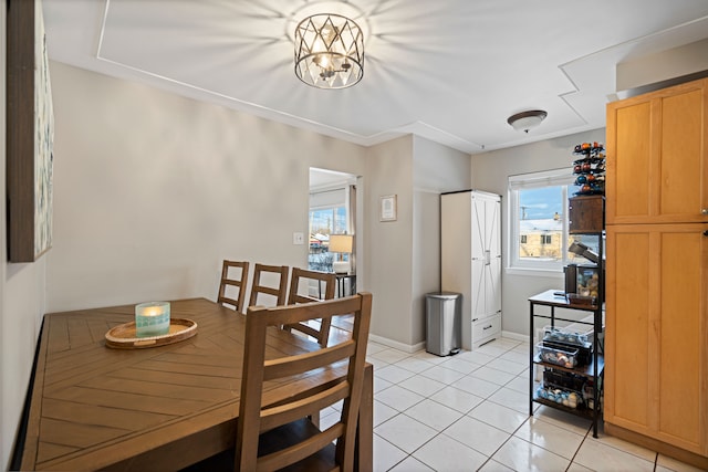 dining space featuring light tile patterned floors